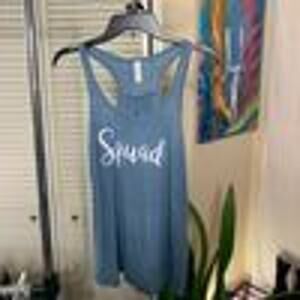 Bella SQUAD white glitter graphic racerback tank heather sky blue Medium NWOT